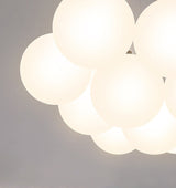 Norr taklampa med kulor i glas